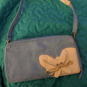 NWOT still has protective wrapping on strap.